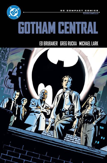 Cover of Gotham Central graphic novel by DC Comics, featuring cityscape artwork and comic book title on the front cover.