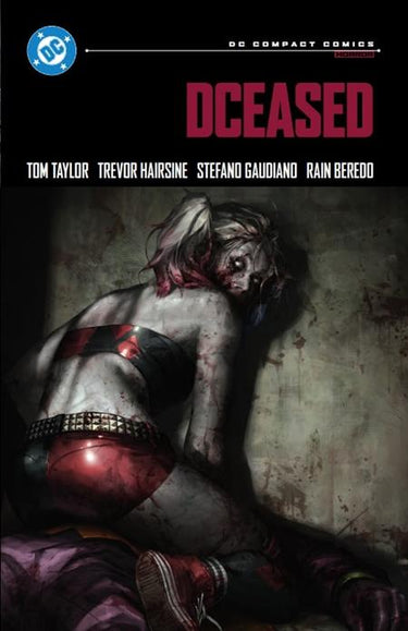 Close-up of the Dceased TPB graphic novel by DC Comics, showcasing vibrant cover art and detailed comic illustrations.