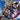 Bandai Hobby SD Gundam World Heroes Benjamin V2 Gundam model kit assembled with detailed blue, white, and red armor and weapon accessories.