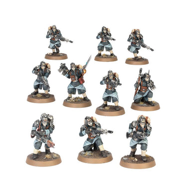 Death Korps of Krieg infantry squad from Games Workshop's tabletop gaming set, featuring soldiers in uniform with rifles.