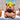 BCmini Capybara Mini Vol.2 blind box with colorful packaging and a partially visible collectible capybara figure inside.
