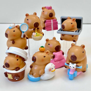 BCmini Capybara Family Figurine Blind Box showing a cute set of small capybara animal figurines inside a sealed blind box.