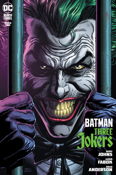 DC Comics Batman Three Jokers #2 premium variant comic book titled "Behind Bars" featuring Batman and Joker in prison scene.