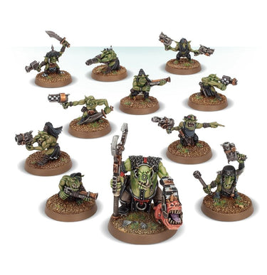Warhammer 40k Orks Runtherd with Gretchin, tabletop gaming miniatures from Games Workshop, featuring orc leader and small green gretchins.