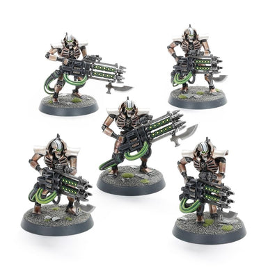 Warhammer 40k Necrons Immortals tabletop gaming miniatures by Games Workshop, featuring detailed robotic soldiers with green energy weapons.